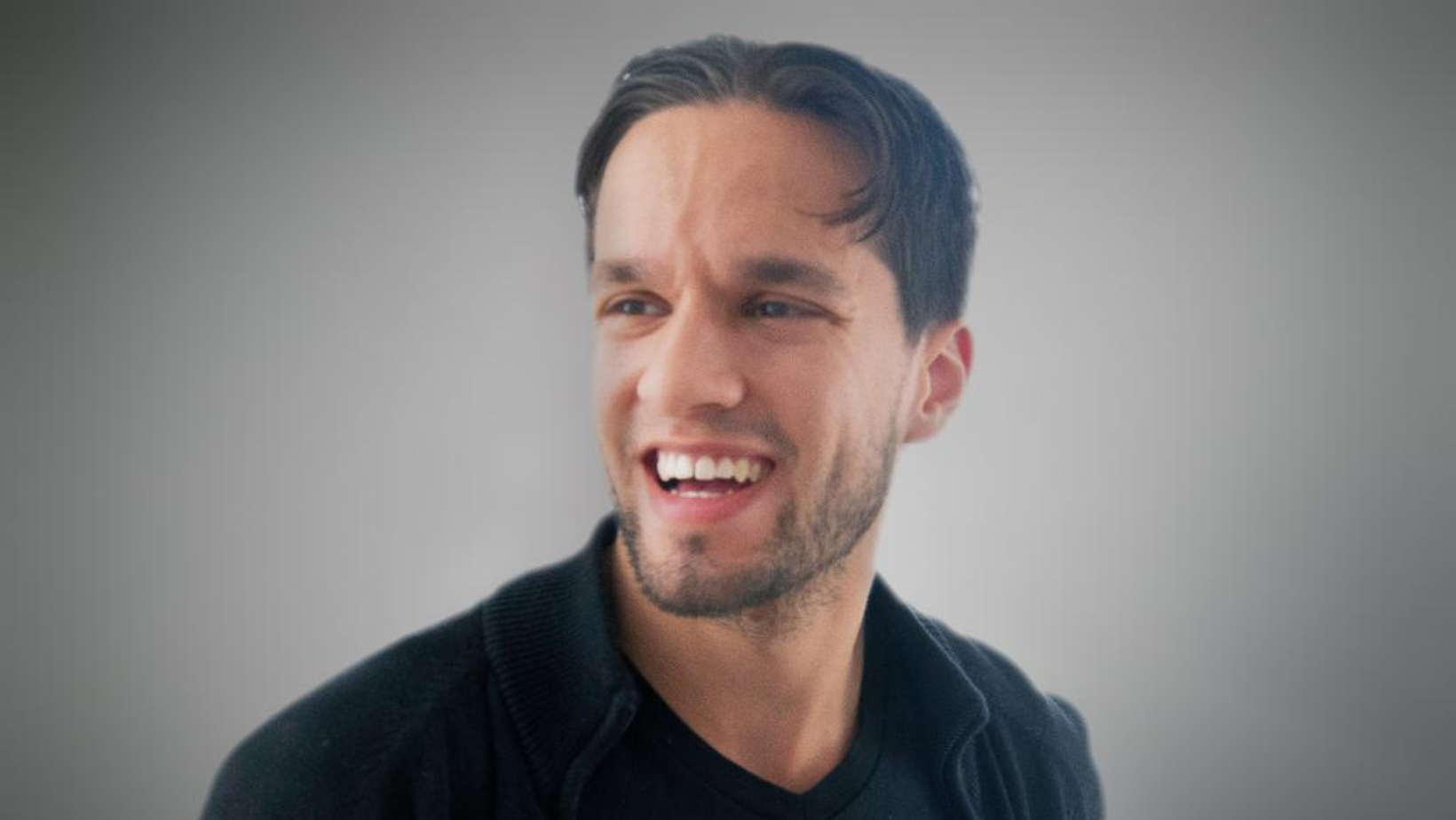 Headshot of Christian Cardozo smiling.