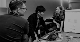 Group of three learners having a discussion 