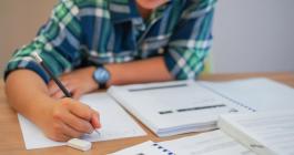 A high school student doing calculus