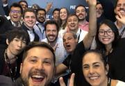 coworkers taking a selfie 