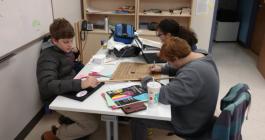 students solving a puzzle game together