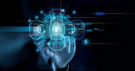 Robot hand tapping on locked computer screen