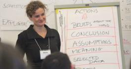 lady lecturing in front of a class