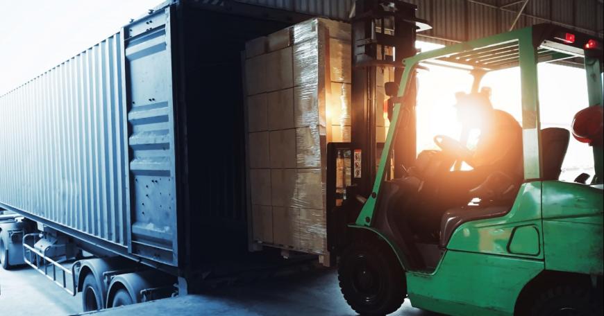 person driving a forklift