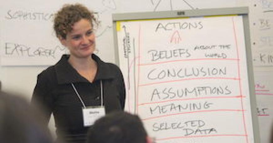lady lecturing in front of a class