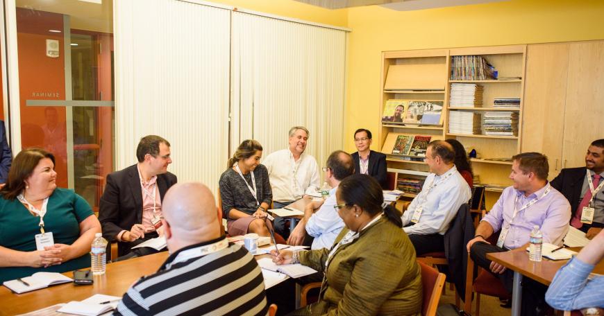 Members of the Workplace Learning at J-WEL Consortium in discussion during the inaugural J-WEL Week in October 2017.