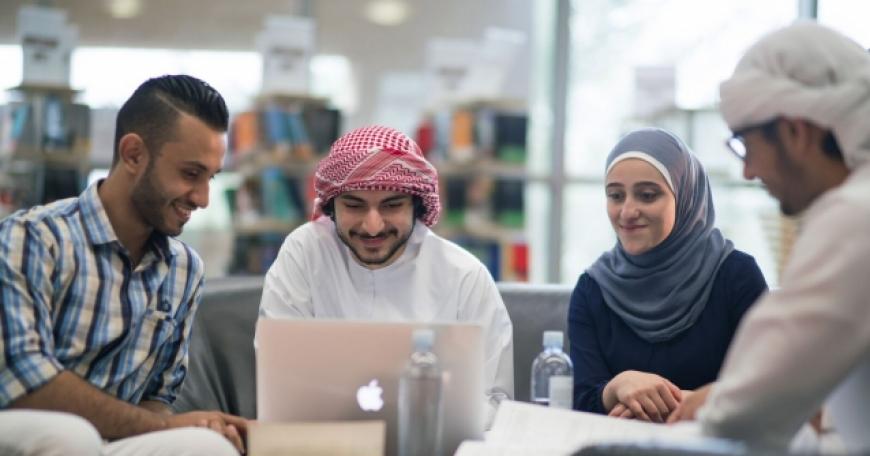 students studying at a table