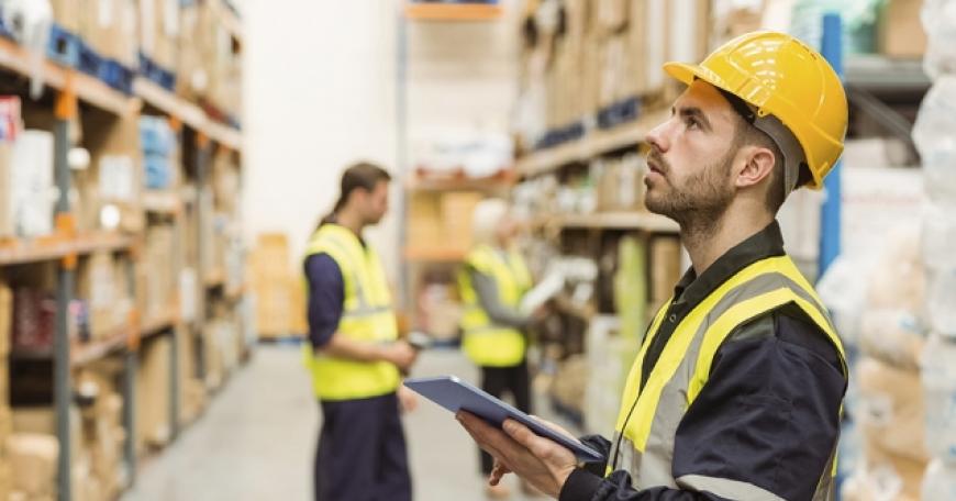 Supply chain manager taking inventory