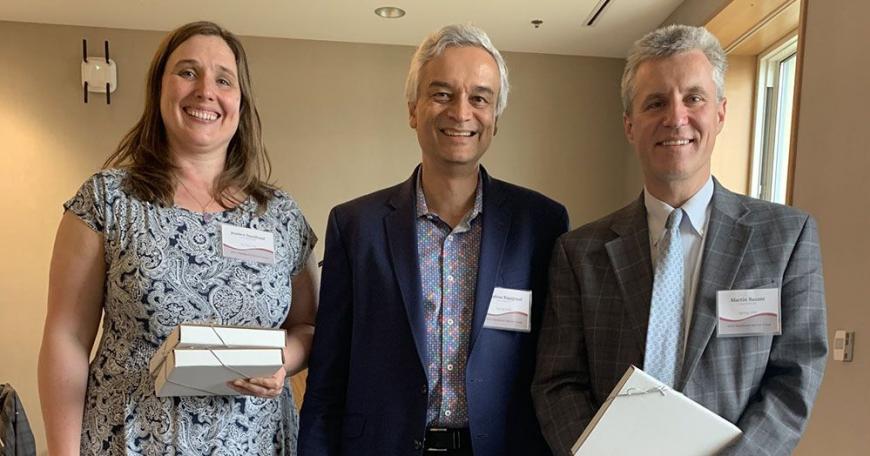 Dean of Digital Learning Krishna Rajagopal (center) with winners of the MITx Prize for Teaching and Learning in MOOCs, Jessica Sandland (left) and Martin Bazant. Not pictured: Polina Anikeeva, who also received the MITx Prize, and John Belcher, Amy Carleton, Jared Curhan, and Erik Demaine, who received Teaching with Digital Technology Awards.
