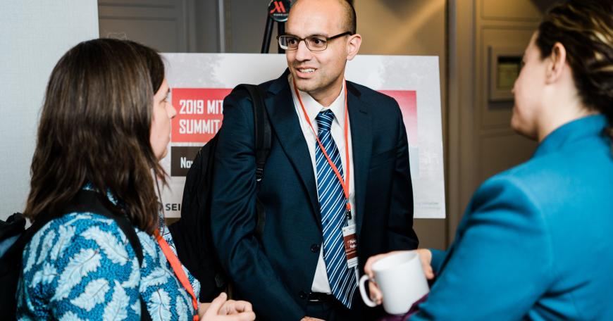 MIT SEII and MITili Co-Director Parag Pathak (center) speaks with unified enrollment experts Gabriela Fighetti of New Orleans, Louisiana, and Catherine Peretti of Washington, D.C.
