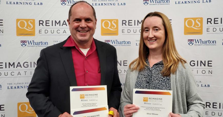 Chris Caplice (left), director of the MicroMasters Program in Supply Chain Management, and Mary Ellen Wiltrout, lecturer in digital learning for biology, receive awards for educational innovation at the QS Reimagine Education Awards.