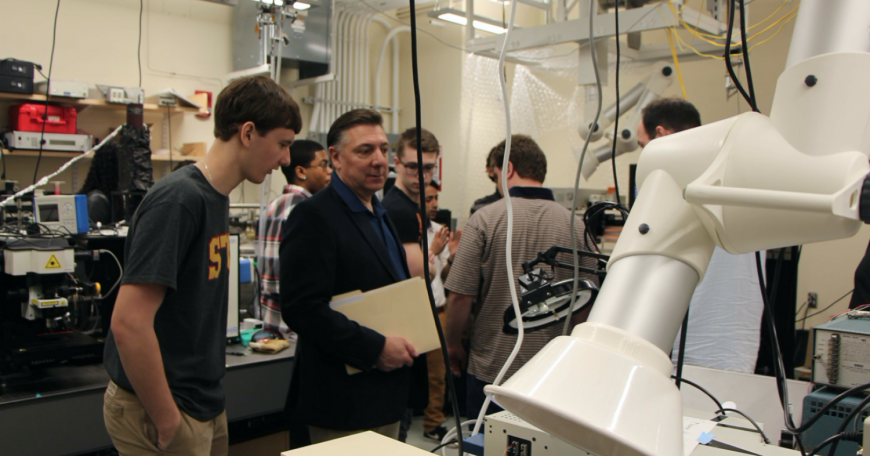 Students and faculty from Springfield Technical Community College visit an MIT lab before the Covid-19 pandemic.