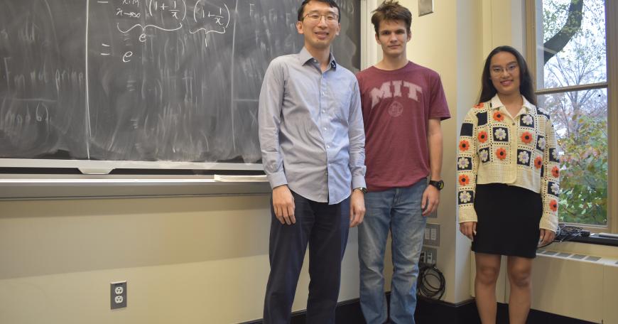 Professor Yufei Zhao (left) stands with his Putnam Seminar undergraduate assistants sophomore Tomasz Ślusarczyk (center) and senior Dain Kim, both of whom also took the class as first-years. “Some of my seminar peers are now among my best friends at MIT,” says Ślusarczyk.