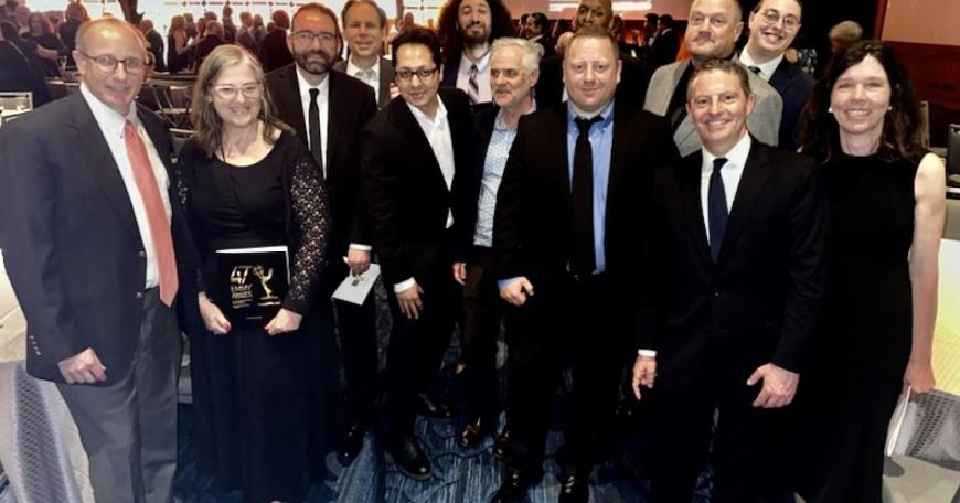MIT Video Productions team at the 47th Boston/New England Emmy Awards Ceremony. Front row, left to right: Rod Lindheim, Dawn Morton, Clayton Hainsworth, Mujtaba Jamali, Jean Dunoyer, Alexander Sachs, Christopher Capozzola, and Brigitte Tersek. Back row, left to right: Frederick Harris, Myles Lowery, Wesley Richardson, Barry Pugatch, and TJ Saccoccio.