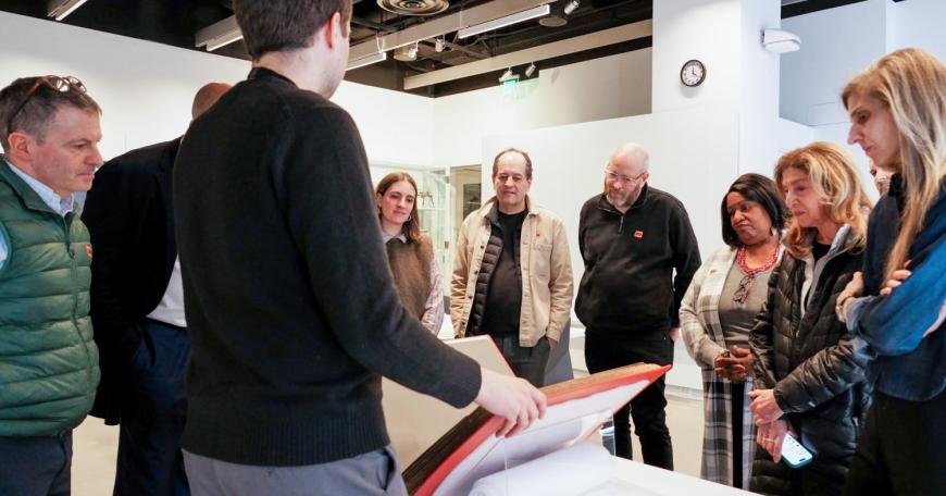 At the MIT Museum, MIT community members gathered around archival materials from Robert R. Taylor's time at the Institute. The encounter situates Taylor’s work as an active point of reference for teaching, research, and ongoing collaboration.