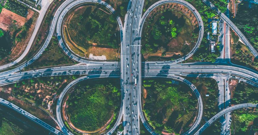 Overhead photo of a highway looping over itself.