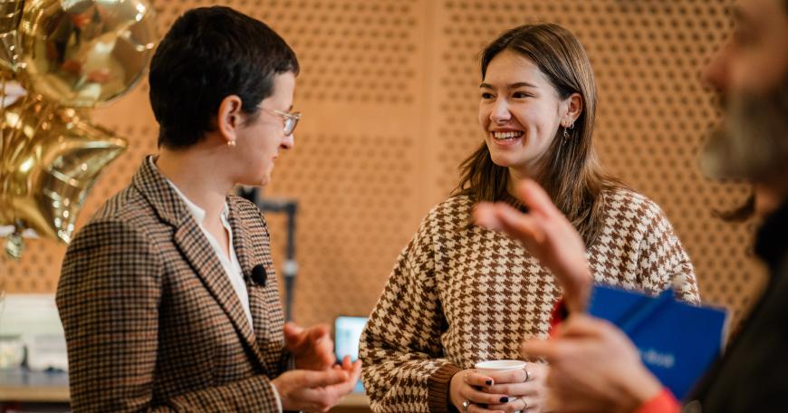 Instructor Maria Khotimsky and student McKenzie Dinesen talking together