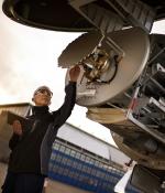 engineer fixing a plane