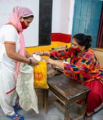 filling up a bag with flour 