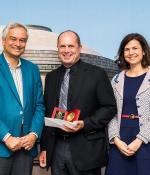Krishna Rajagopal (left) presents the Irwin Sizer Award for the Most Significant Improvement to MIT Education to Chris Caplice (left) and Eva Ponce.