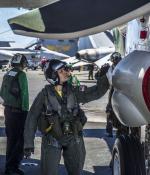 The U.S. Naval Air Systems Command views a shift to model-based systems engineering as an essential step in shortening and modernizing its abilities to deliver high-quality, state-of-the-art programs. Pictured here is Cmdr. Cynthia Dieterly, commanding officer of Carrier Airborne Early Warning Squadron 115 conducts pre-flight checks on an E-2C Hawkeye prior to launch from the Nimitz-class aircraft carrier USS George Washington.