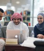 students studying at a table