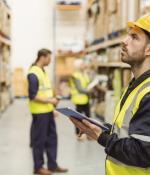 Supply chain manager taking inventory