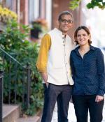 MIT economists Abhijit Banerjee and Esther Duflo stand outside their home after learning that they have been named co-winners of the 2019 Nobel Prize in economic sciences. They will share the prize with Michael Kremer of Harvard University.
