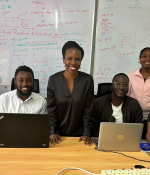 June Odongo (left) and Cynthia Wacheke, both standing, with members of the software team at Senga Technologies