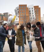 Students in the 2023 DEDP master’s cohort gather on MIT’s campus.