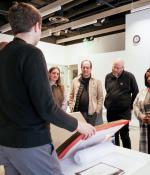 At the MIT Museum, MIT community members gathered around archival materials from Robert R. Taylor's time at the Institute. The encounter situates Taylor’s work as an active point of reference for teaching, research, and ongoing collaboration.