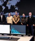 Visiting the cyber range and security operations center at Bridgewater State University are (left to right) Muhammad Umar (Brandeis University), Kahlen Wheaton (MIT), Jungwoo Chun (MIT), Hannarae Lee (BSU), Larry Susskind (MIT), and Almaz Kasymbekov (Brandeis).