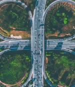Overhead photo of a highway looping over itself.
