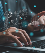 Person typing on a laptop with an AI concept visible 