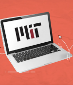 Open laptop with MIT logo on the screen